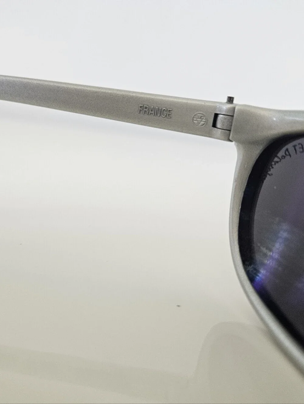 Vuarnet Silver Oval Sunglasses with Dark Lenses